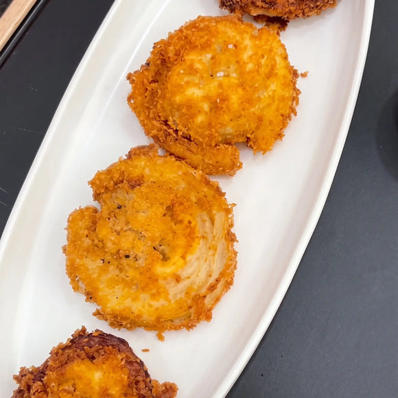 Thumbnail for article: Whomp! Stuffed Mac and Cheese Onion Rings